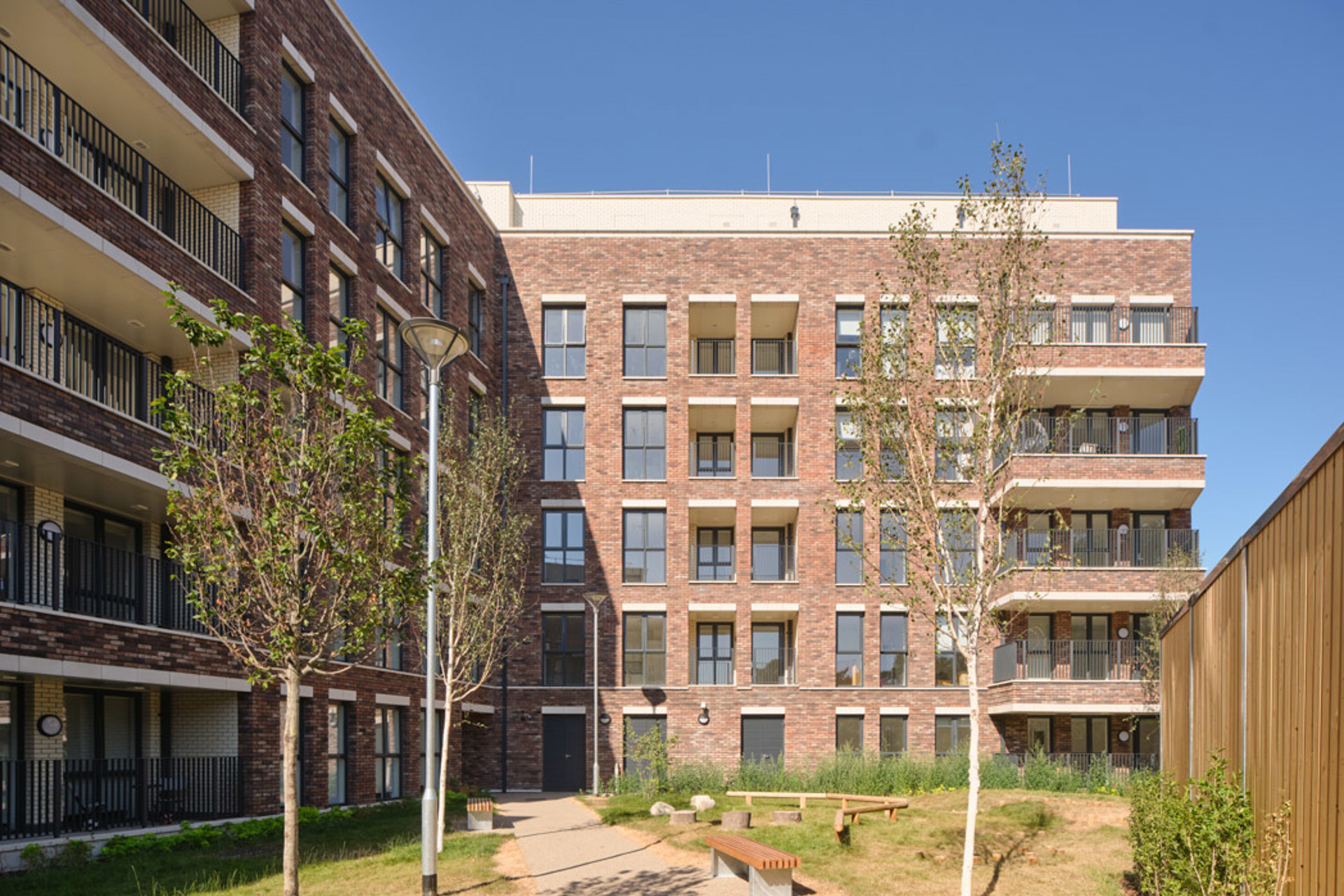 The Grange has 77 flats set over two buildings in Plaistow, connected with a shared garden.
